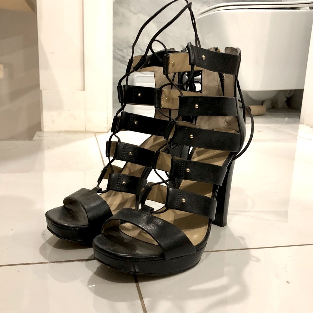 Micheal Kors lace up sandals in Black